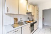 Kapitalanlage in Hamburg-Osdorf: Vermietete 2-Zimmer-Wohnung mit Balkon & Garage - küche